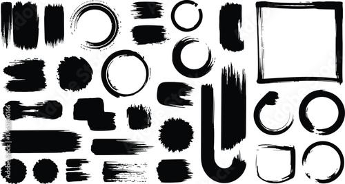 Black ink brush strokes and shapes paint splatters