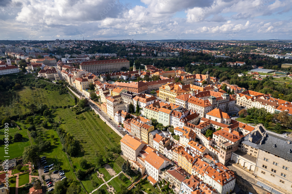 Fototapeta premium Beautiful aerial and detailed view of Prague Castle with St. Vitus Cathedral and the Old Royal Palace, Czech Republic — Gothic architecture and panoramic city skyline