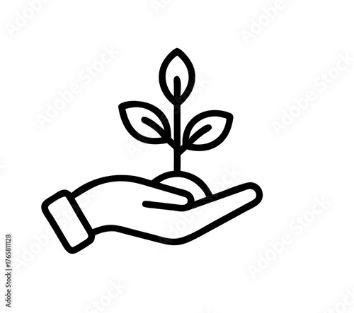 A hand holding a growing plant a symbol of care