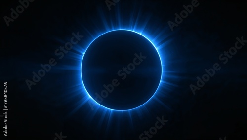 Abstract circular blue flare glow emerging from darkness, soft atmospheric light radiating from center, futuristic space energy background.