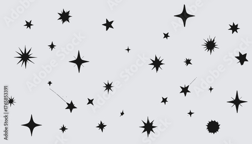 Black star shapes of various sizes, with points, against a light gray background