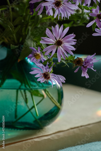 Fotografie bouquet of  violet flowers in vase , stilllife for interior decoration