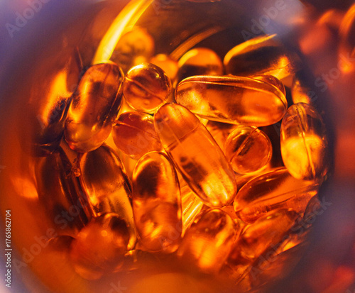 Dietary Supplements: Capsules Scattered from Container