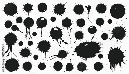Black ink splashes and splatters of various sizes, with drops and textures, on white background