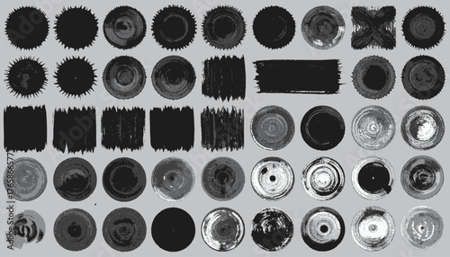 A collection of various hand-drawn shapes and textures in monochrome, arranged on a neutral grey background