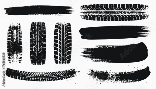 Collection of various tire tracks and brush strokes in solid black against white background