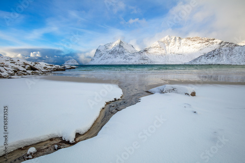 Stream and Winter Fjord in Lofoten