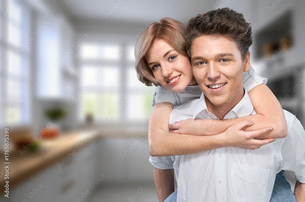 Fototapeta premium Happy beautiful couple cuddling enjoy talk at home