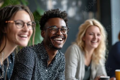Happy Friends Enjoying Coffee and Laughter in a Cafe Setting