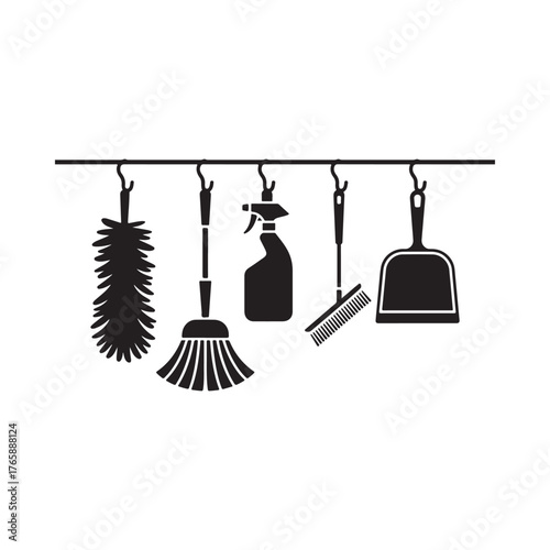 Set of cleaning tools hanging on a rack for housekeeping and tidiness
