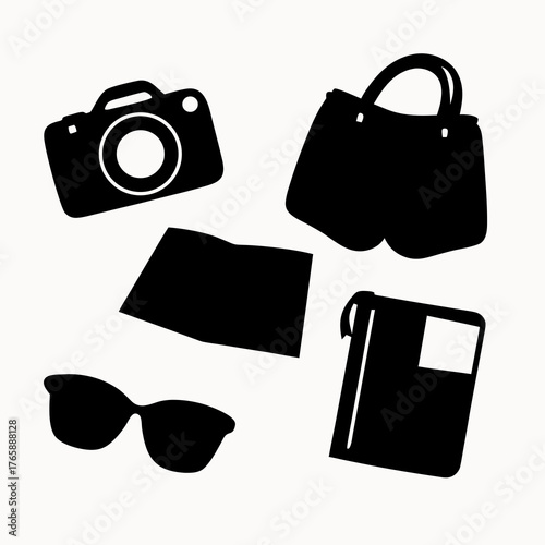 A collection of travel essentials including a camera, bag, book, sunglasses, and a map displayed