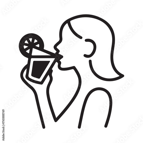 Woman drinking a refreshing beverage with a lemon slice garnish