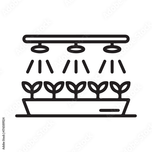 Indoor seedling growth under artificial grow lights and irrigation system