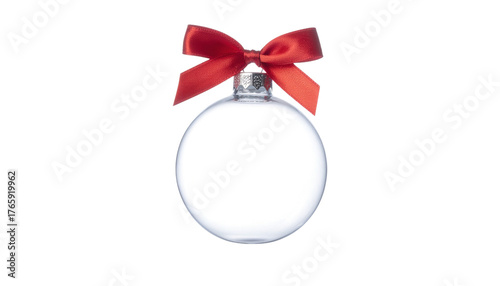 Clear round christmas ornament with a red satin bow tied at the top, centered on clean white background