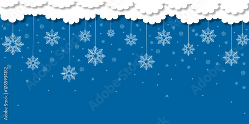 Paper cut clouds with snowflakes on blue sky background. Snowy winter holiday banner for Christmas and New Year Design. Vector eps