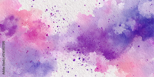Abstract watercolor splashes and splatters in vibrant pink purple and blue hues