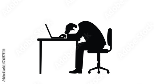Silhouette of a person slumped over a laptop at a desk