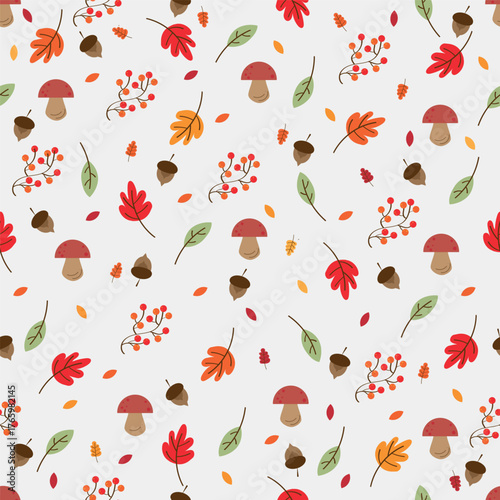 Vector illustration. Fall leaves,  mountain ash and mushrooms seamless pattern in  autumn color palette. Decorative background. Perfect for seasonal textiles, wallpapers, gift wrap and  backgrounds.