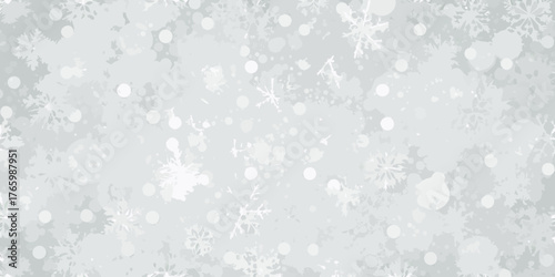 Softly falling snow and snowflakes creating a gentle winter wonderland background texture
