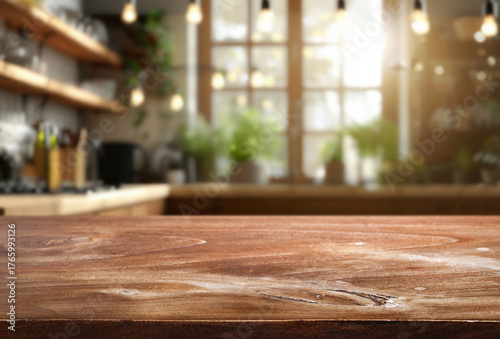 Warm wooden countertop in a cozy kitchen with soft lighting and plants in the background