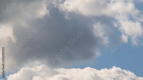  Bright clouds are flying across the sky. Timelapse 