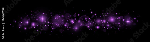 Festive particles and bokeh with glowing stardust.