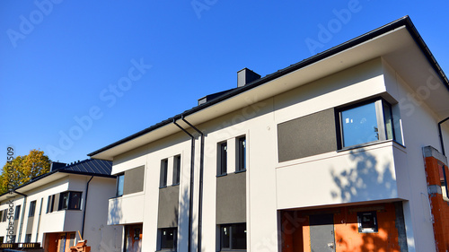 Terraced houses under construction. Housing estate development under construction.  
