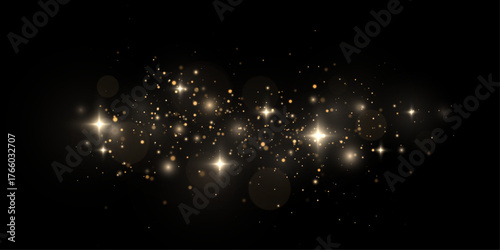 Glowing stardust and shimmering particles, a magical festive sparkle with vibrant golden light.
