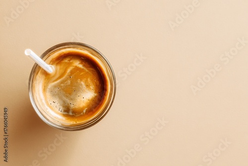 Creamy Beverage With Froth in a Glass on a Smooth Surface During Natural Light