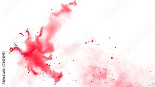 A vibrant explosion of red powder suspended in mid-air, capturing dynamic energy and movement.