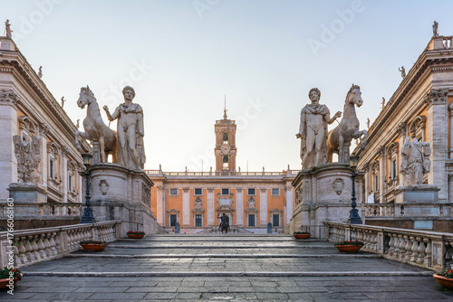 Konstfotografi Cordonata staircase leading up to the Piazza del Campidoglio on the Capitoline Hill square with ancient statues and historic architecture in Rome city, Italy, at sunrise