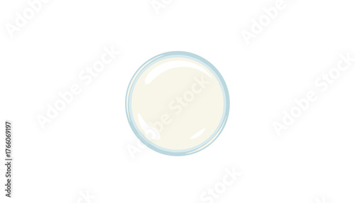 Top view of a refreshing glass of milk, presented on a pristine white background, showcasing the creamy texture and purity of this wholesome beverage, perfect for health and nutrition-related content.
