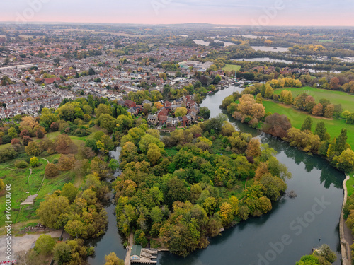 Elevated capture of the River Thames at Reading in Berkshire, UK, showing the Caversham Weir and surrounding parks