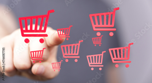 Hand pointing at shopping c...