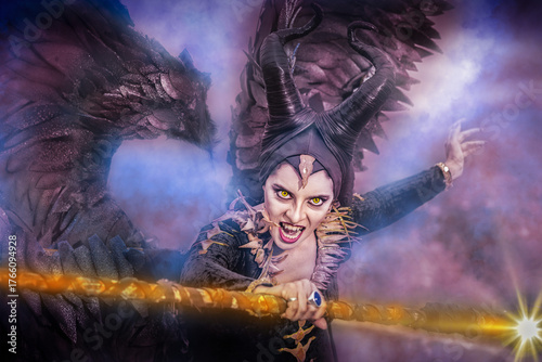 Billede på lærred Fantasy portrait of evil fairy in dark costume with horns and wings