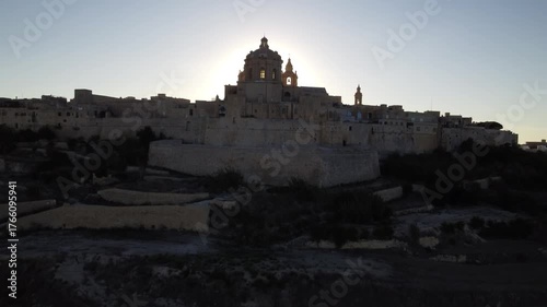 Aerial drone footage of the medieval city of Mdina in Malta a sunset
