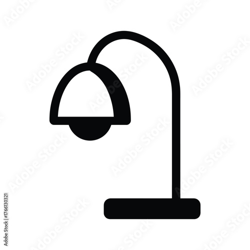 One simple black desk lamp stands elegantly against a clean white background