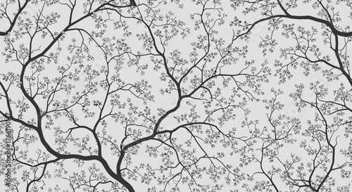Elegant monochrome illustration of intertwining tree branches with delicate leaves, a seamless natural pattern perfect for backgrounds and textiles
