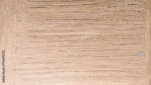Cuadro en lienzo A beautiful abstract background of a freshly tilled field seen from a top down a