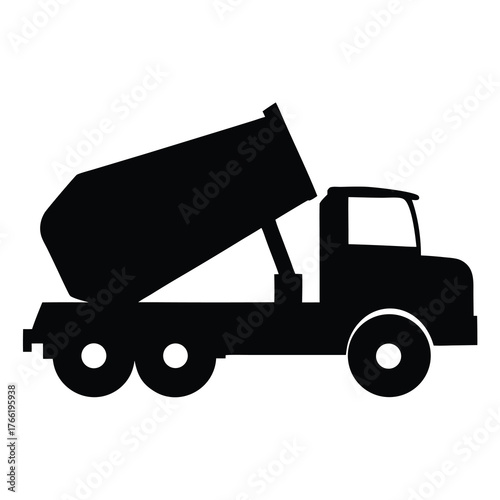 Silhouette of a dump truck with its bed raised ready to unload materials
