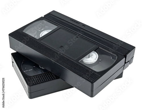 Two black VHS tapes stacked slightly angled against a black backdrop, showcasing their rectangular shapes