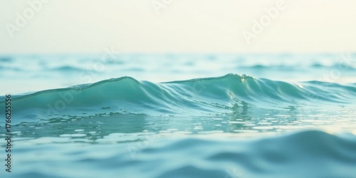 Fototapeta Naklejka Na Ścianę i Meble -  Serene Aqua Wavelets Gently Rolling on a Calm Ocean Surface