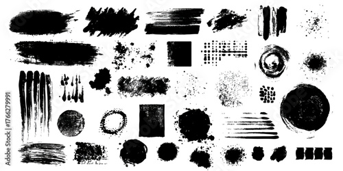 Collection of black ink brush strokes and textures on white background abstract art