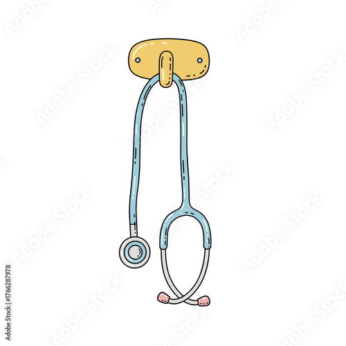 Stethoscope hanging on wall mount in medical environment  