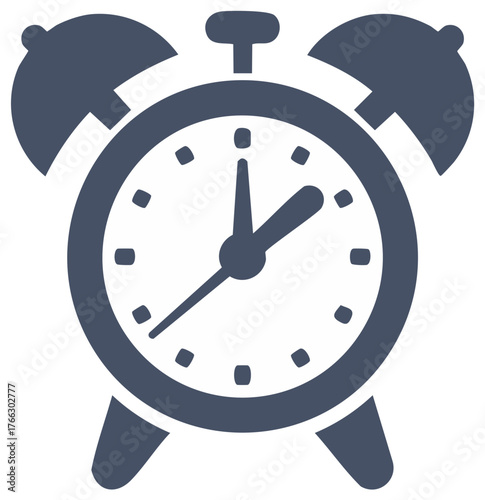 Classic twin bell alarm clock with hands indicating early morning time