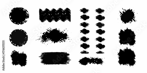 Collection of black ink brush stroke shapes and splatters on a white background