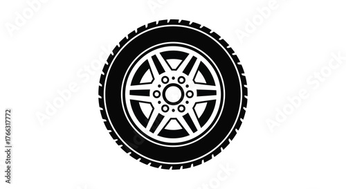 Detailed black and white silhouette of a car wheel and tire with a classic spoke design on a white background