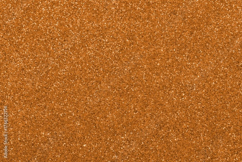 copper color glitter texture ideal as a brilliant shining background for metal