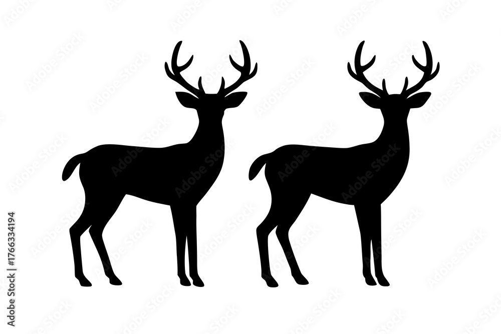 Obraz premium Two elegant black deer silhouettes with impressive antlers standing side by side isolated on white background silhouette