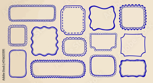 Collection of blue decorative frames on a beige background.